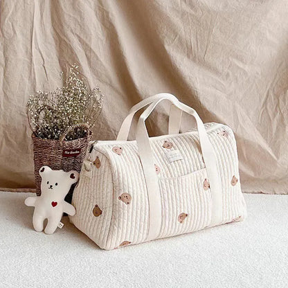 Sac à langer doux et spacieux avec bandoulière et poches intérieures